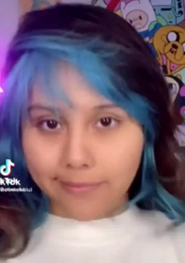 Neekolul with blue hair